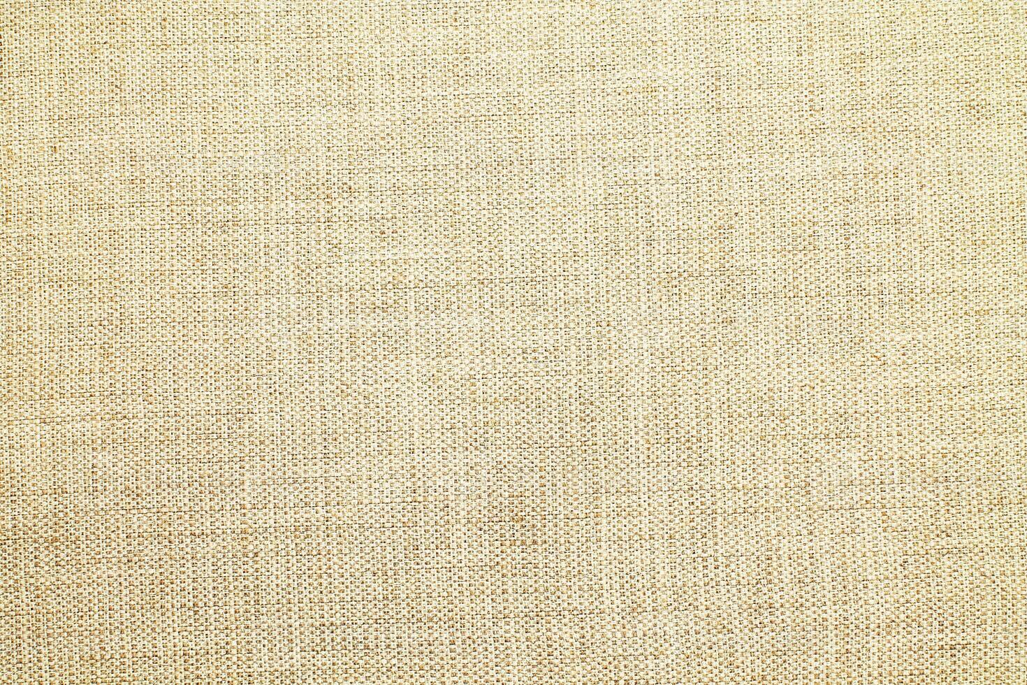 Natural linen material textile canvas Fabric texture background Close-up detail of fabric natural color Hemp material pattern design wallpaper. can be used as background or for graphic design photo