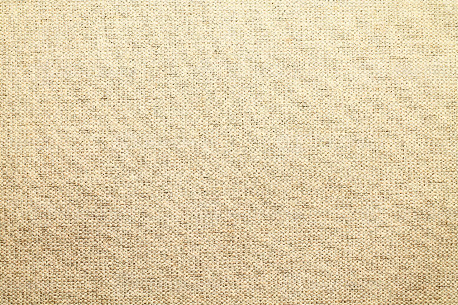 Natural linen material textile canvas Fabric texture background Close-up detail of fabric natural color Hemp material pattern design wallpaper. can be used as background or for graphic design photo