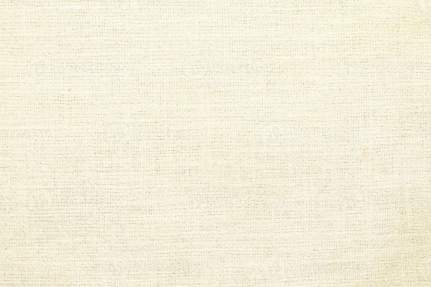 Natural linen material textile canvas Fabric texture background Close-up detail of fabric natural color Hemp material pattern design wallpaper. can be used as background or for graphic design photo