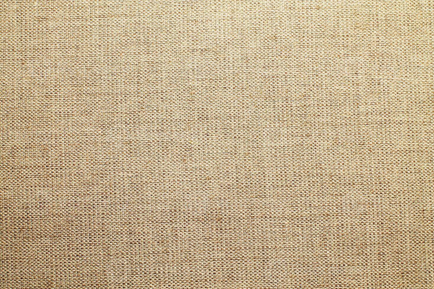 Natural linen material textile canvas Fabric texture background Close-up detail of fabric natural color Hemp material pattern design wallpaper. can be used as background or for graphic design photo