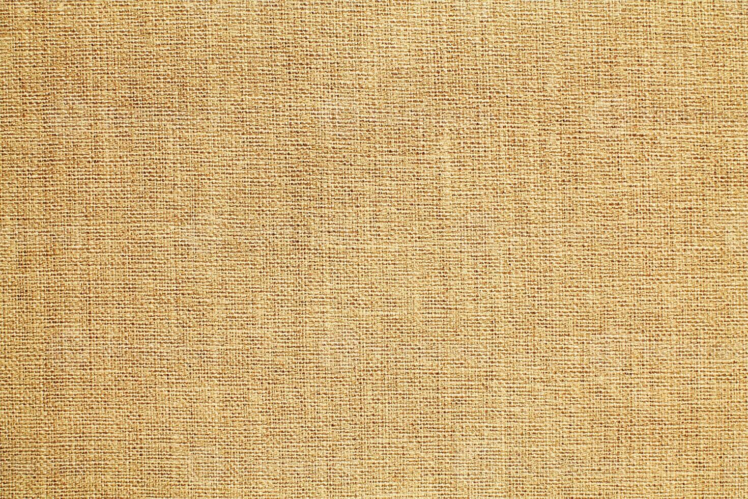 Natural linen material textile canvas Fabric texture background Close-up detail of fabric natural color Hemp material pattern design wallpaper. can be used as background or for graphic design photo