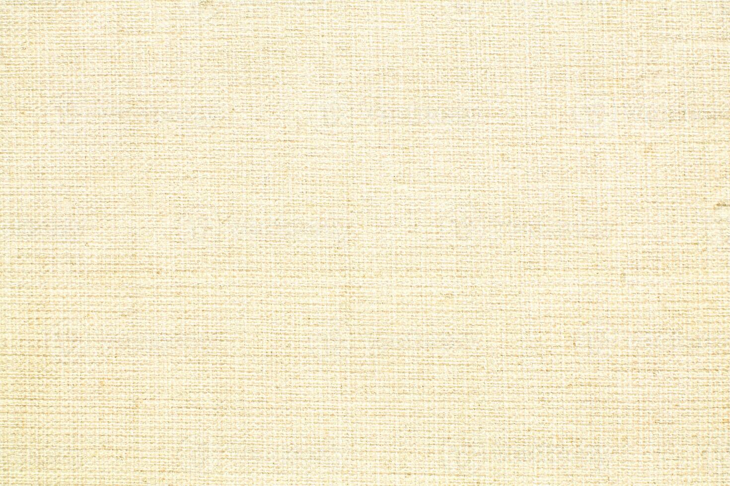 Natural linen material textile canvas Fabric texture background Close-up detail of fabric natural color Hemp material pattern design wallpaper. can be used as background or for graphic design photo
