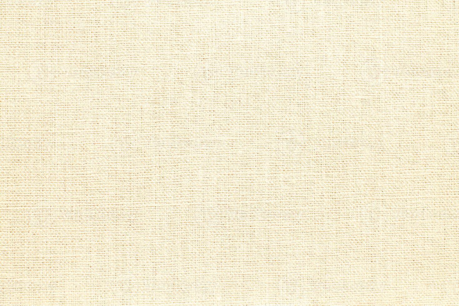 Natural linen material textile canvas Fabric texture background Close-up detail of fabric natural color Hemp material pattern design wallpaper. can be used as background or for graphic design photo