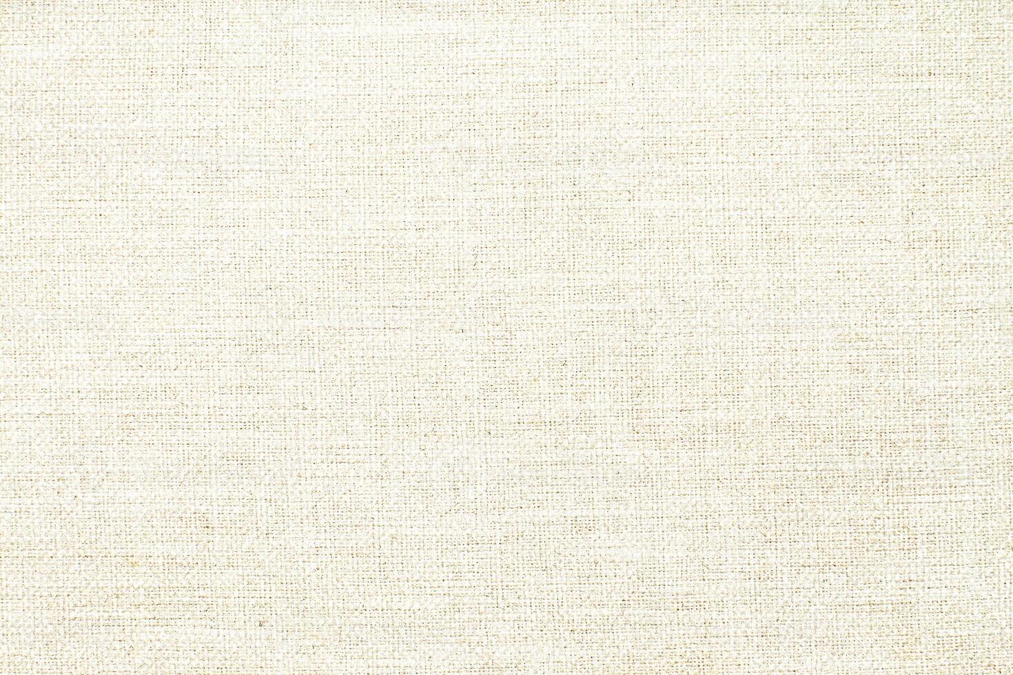 Natural linen material textile canvas Fabric texture background Close-up detail of fabric natural color Hemp material pattern design wallpaper. can be used as background or for graphic design photo