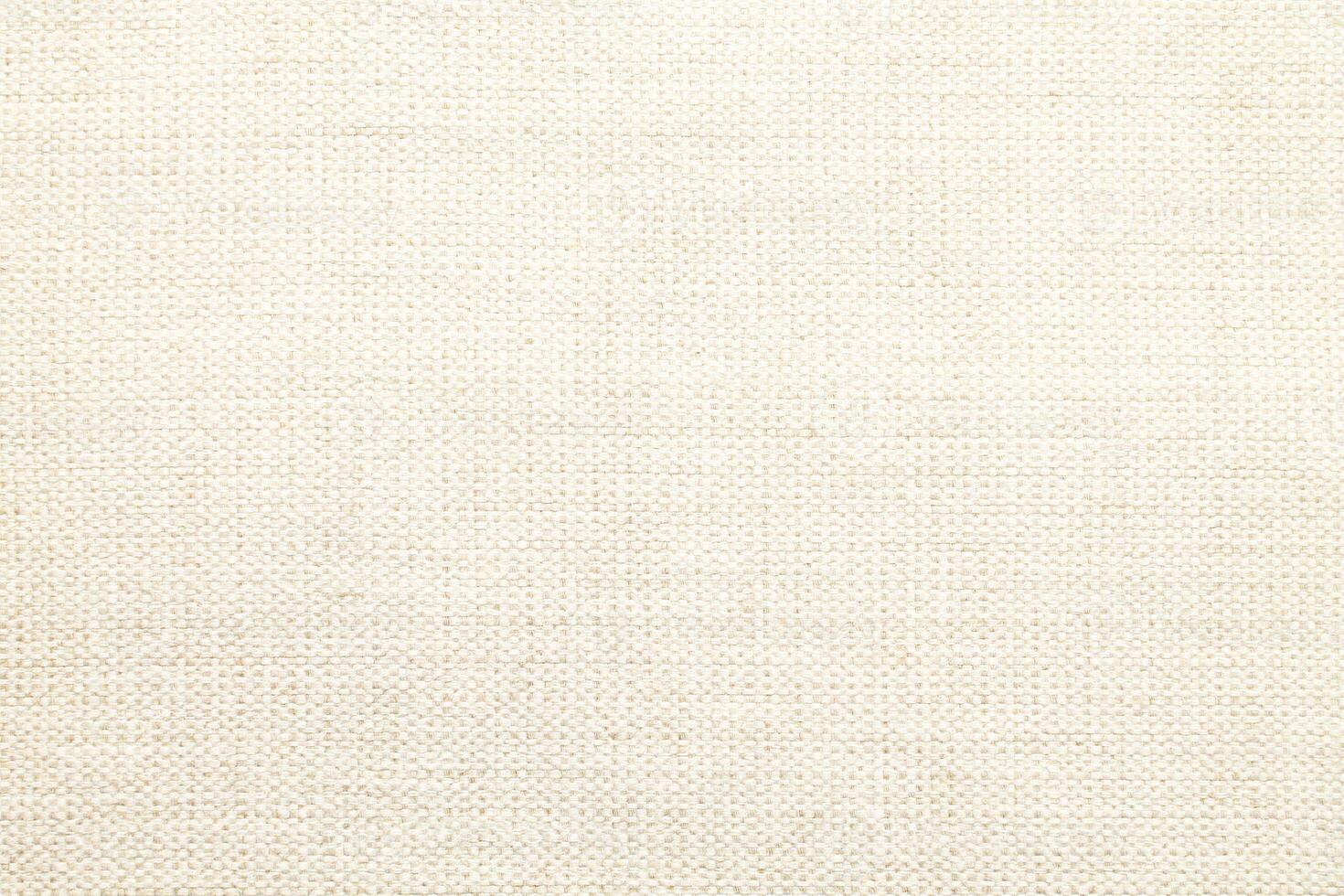 Natural linen material textile canvas Fabric texture background Close-up detail of fabric natural color Hemp material pattern design wallpaper. can be used as background or for graphic design photo