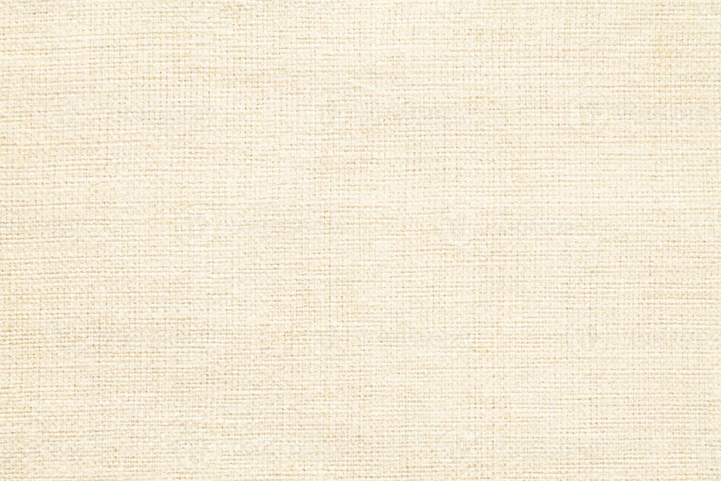 Natural linen material textile canvas Fabric texture background Close-up detail of fabric natural color Hemp material pattern design wallpaper. can be used as background or for graphic design photo