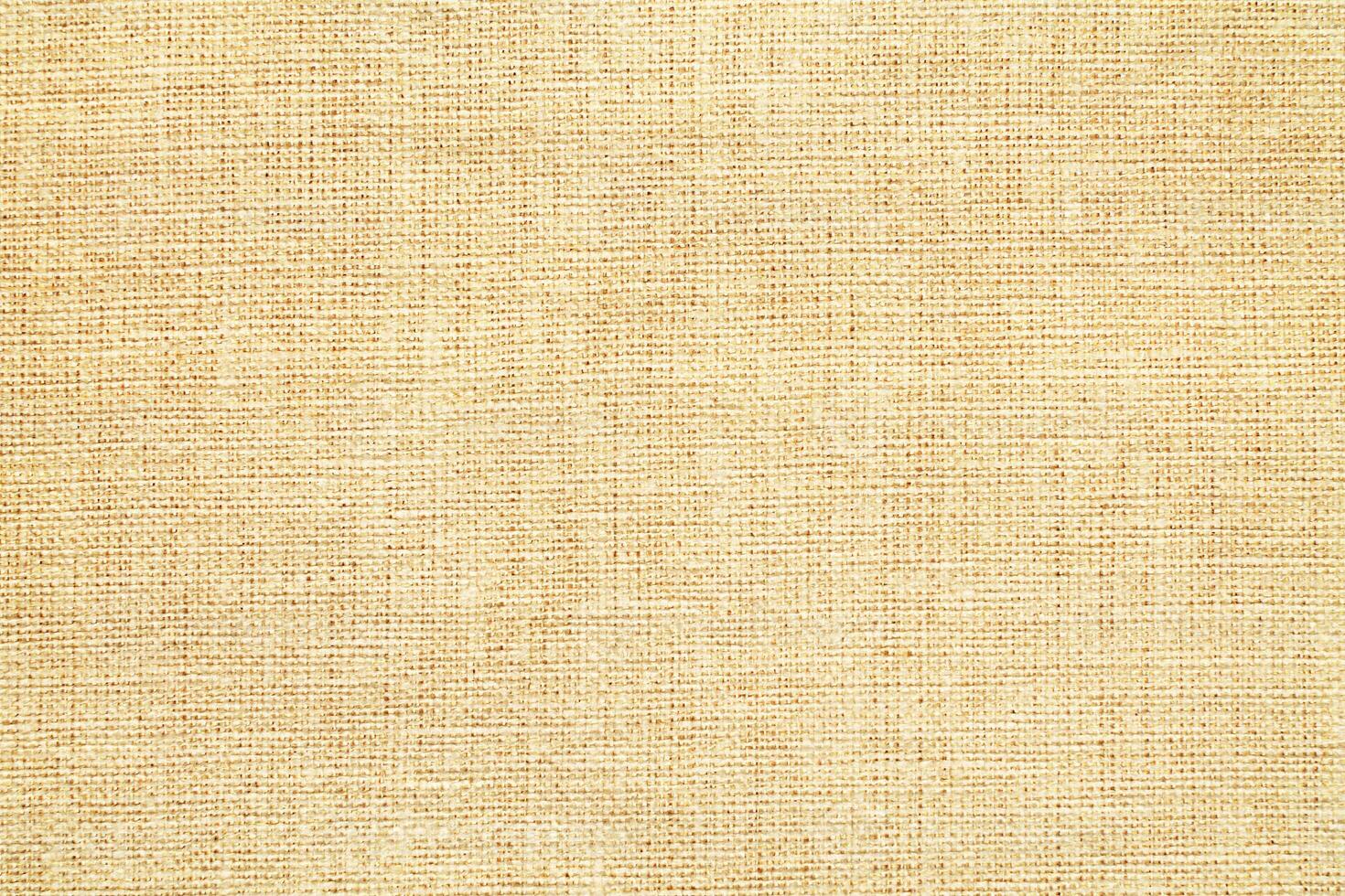 Natural linen material textile canvas Fabric texture background Close-up detail of fabric natural color Hemp material pattern design wallpaper. can be used as background or for graphic design photo