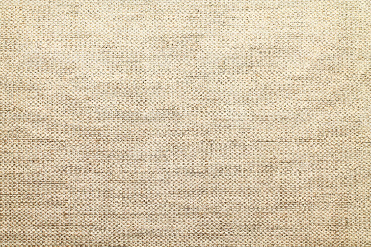 Natural linen material textile canvas Fabric texture background Close-up detail of fabric natural color Hemp material pattern design wallpaper. can be used as background or for graphic design photo