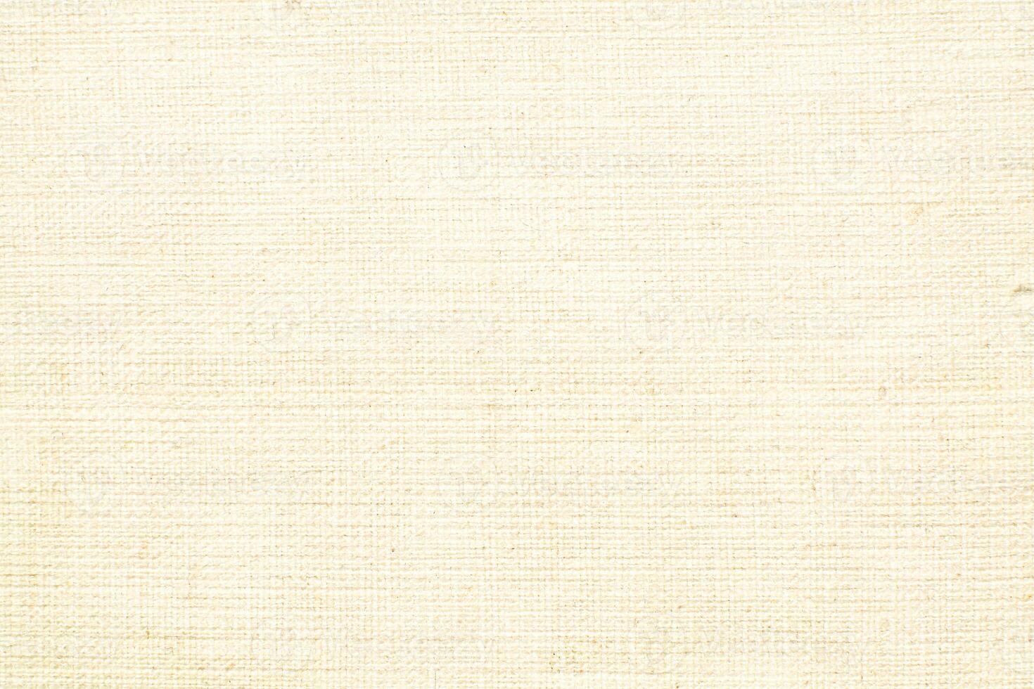 Natural linen material textile canvas Fabric texture background Close-up detail of fabric natural color Hemp material pattern design wallpaper. can be used as background or for graphic design photo
