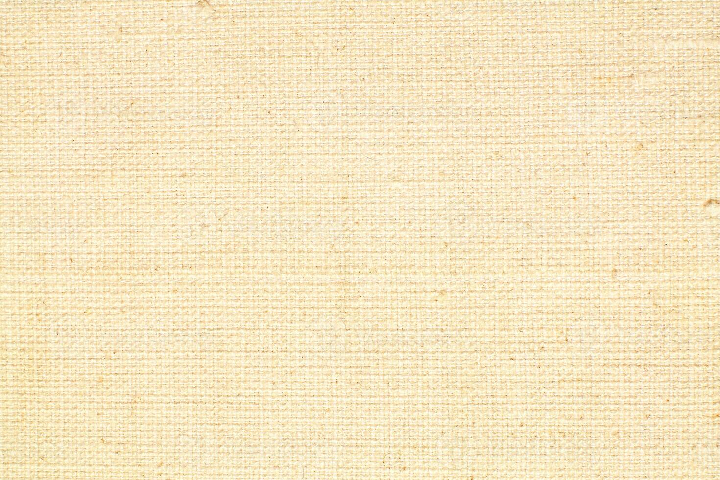 Natural linen material textile canvas Fabric texture background Close-up detail of fabric natural color Hemp material pattern design wallpaper. can be used as background or for graphic design photo