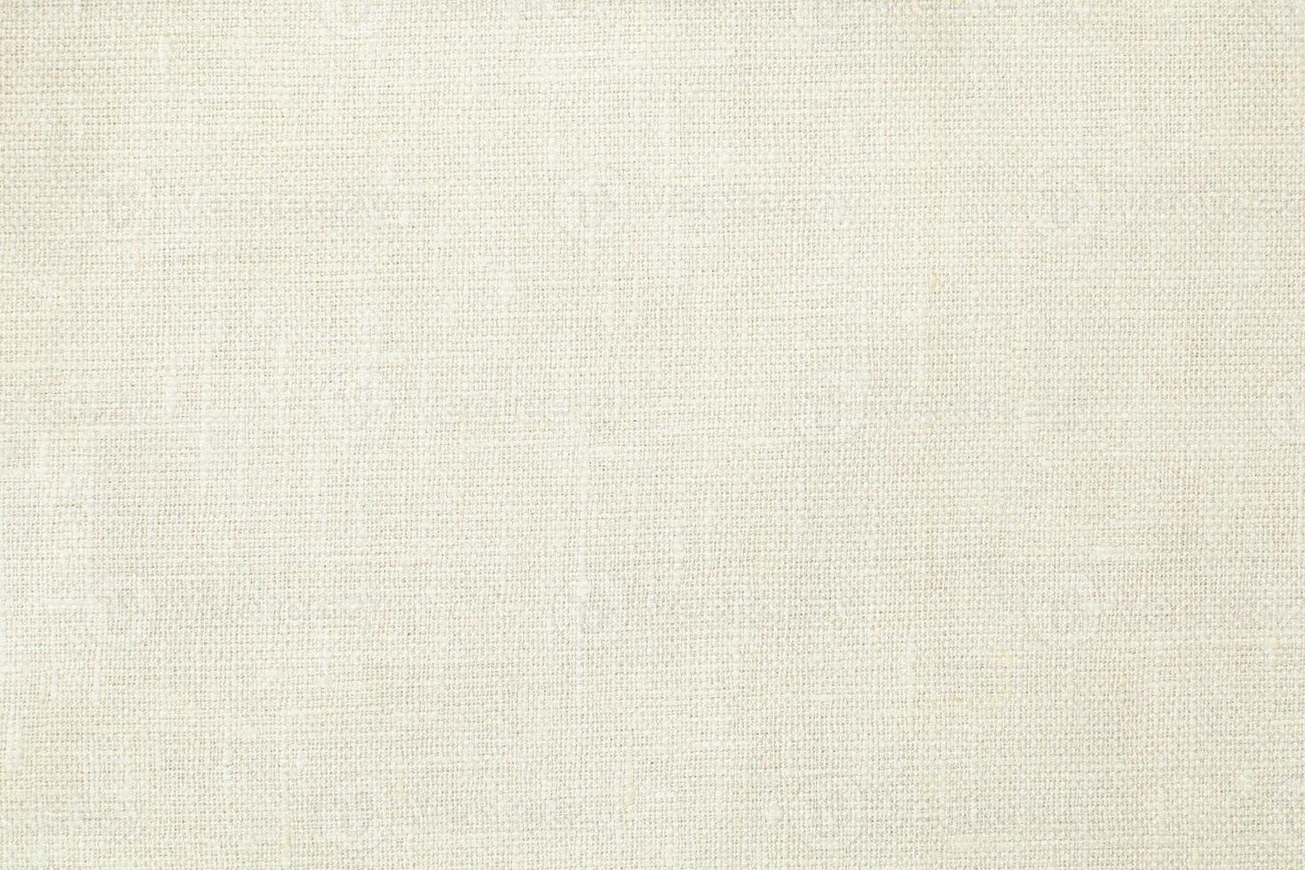 Natural linen material textile canvas Fabric texture background Close-up detail of fabric natural color Hemp material pattern design wallpaper. can be used as background or for graphic design photo