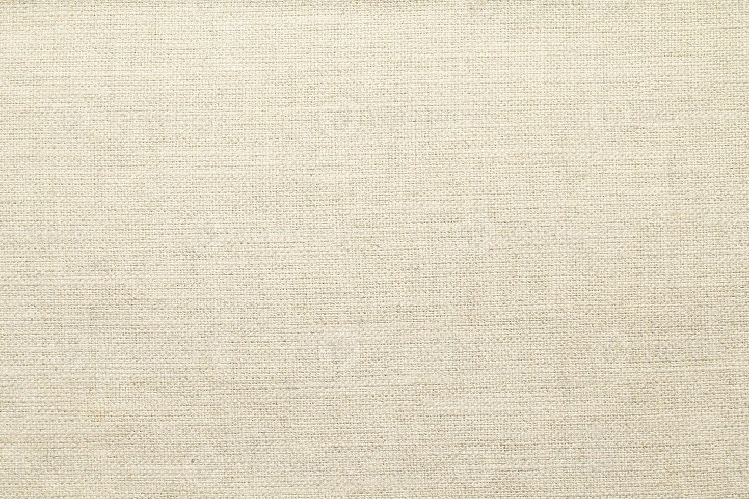 Natural linen material textile canvas Fabric texture background Close-up detail of fabric natural color Hemp material pattern design wallpaper. can be used as background or for graphic design photo