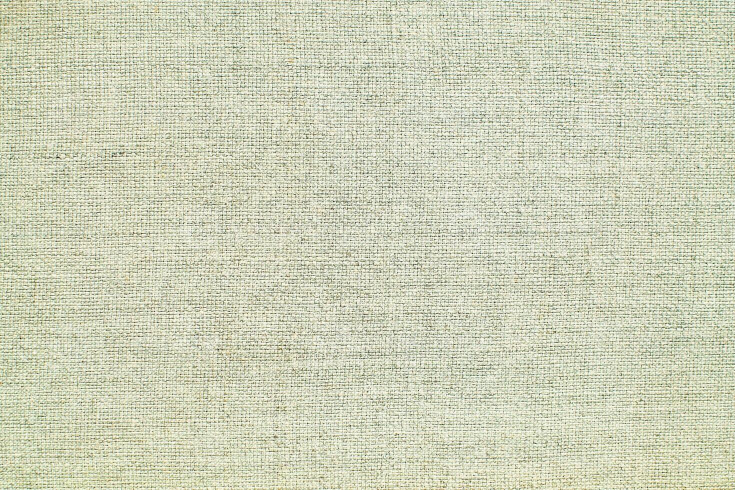 Natural linen material textile canvas Fabric texture background Close-up detail of fabric natural color Hemp material pattern design wallpaper. can be used as background or for graphic design photo