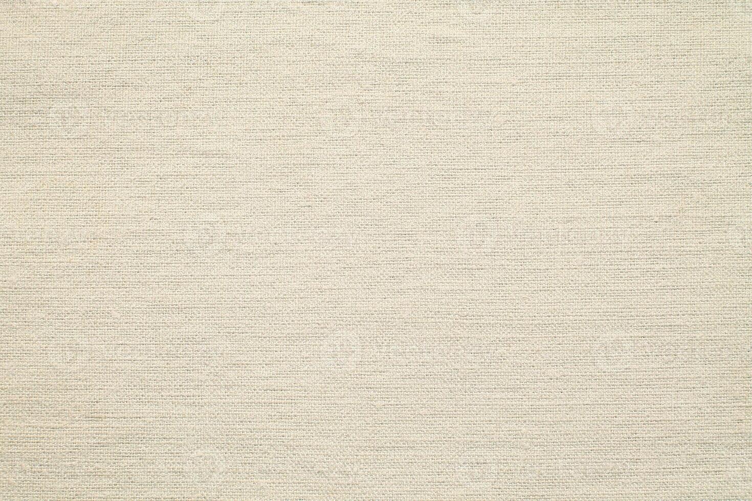 Natural linen material textile canvas Fabric texture background Close-up detail of fabric natural color Hemp material pattern design wallpaper. can be used as background or for graphic design photo