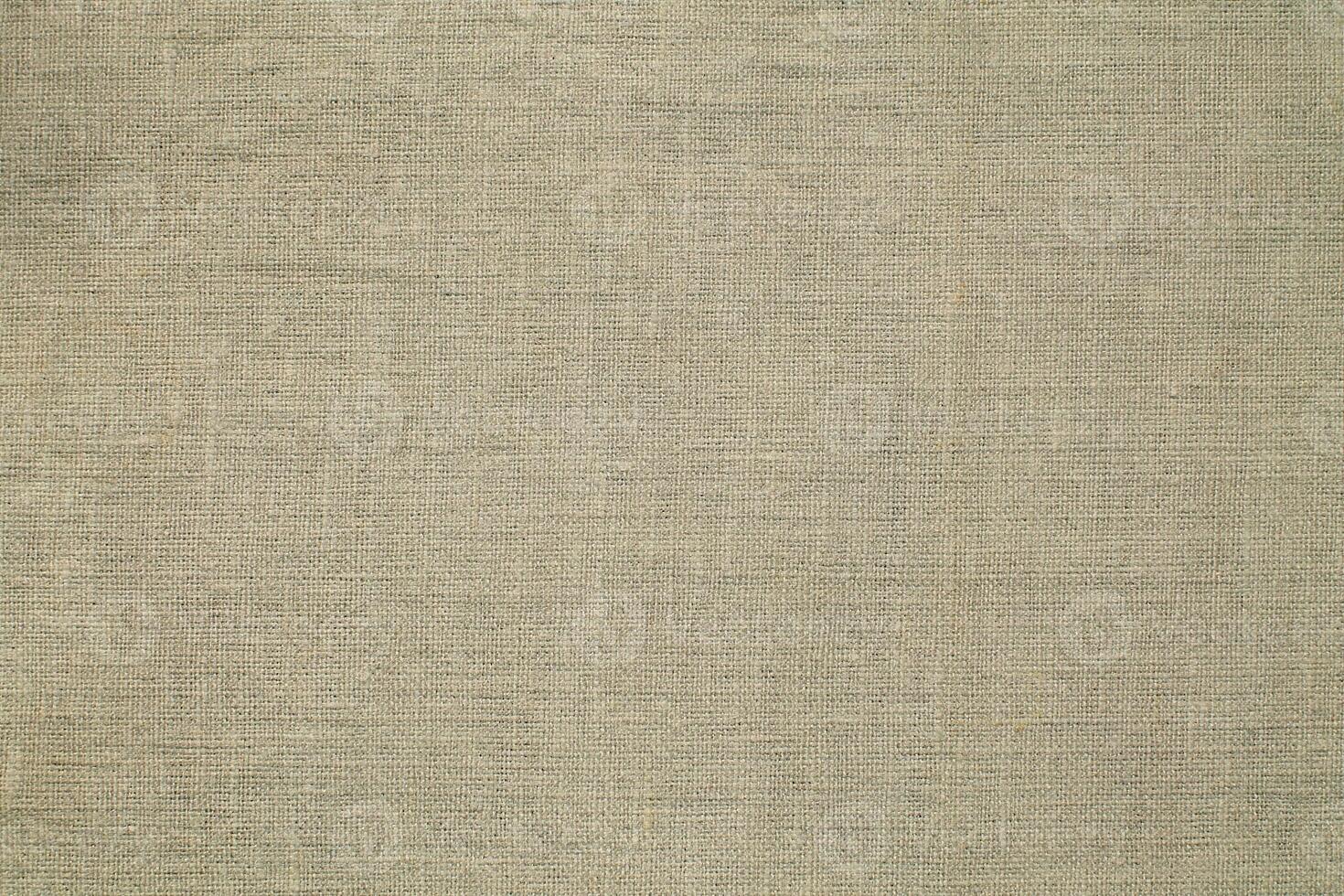 Natural linen material textile canvas Fabric texture background Close-up detail of fabric natural color Hemp material pattern design wallpaper. can be used as background or for graphic design photo