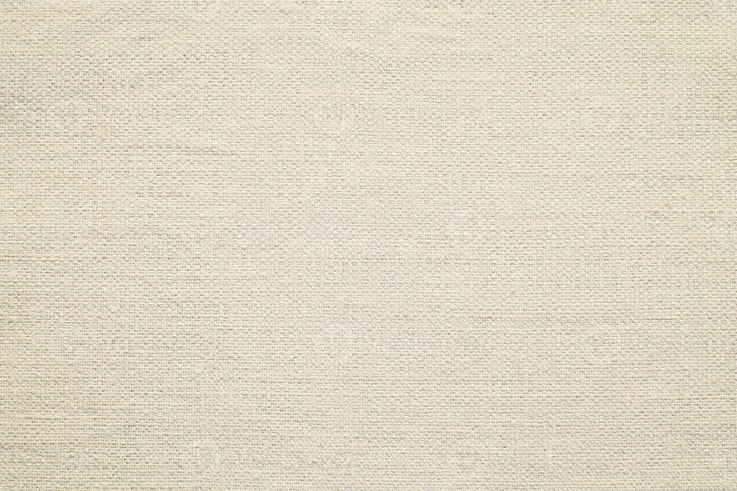 Natural linen material textile canvas Fabric texture background Close-up detail of fabric natural color Hemp material pattern design wallpaper. can be used as background or for graphic design photo
