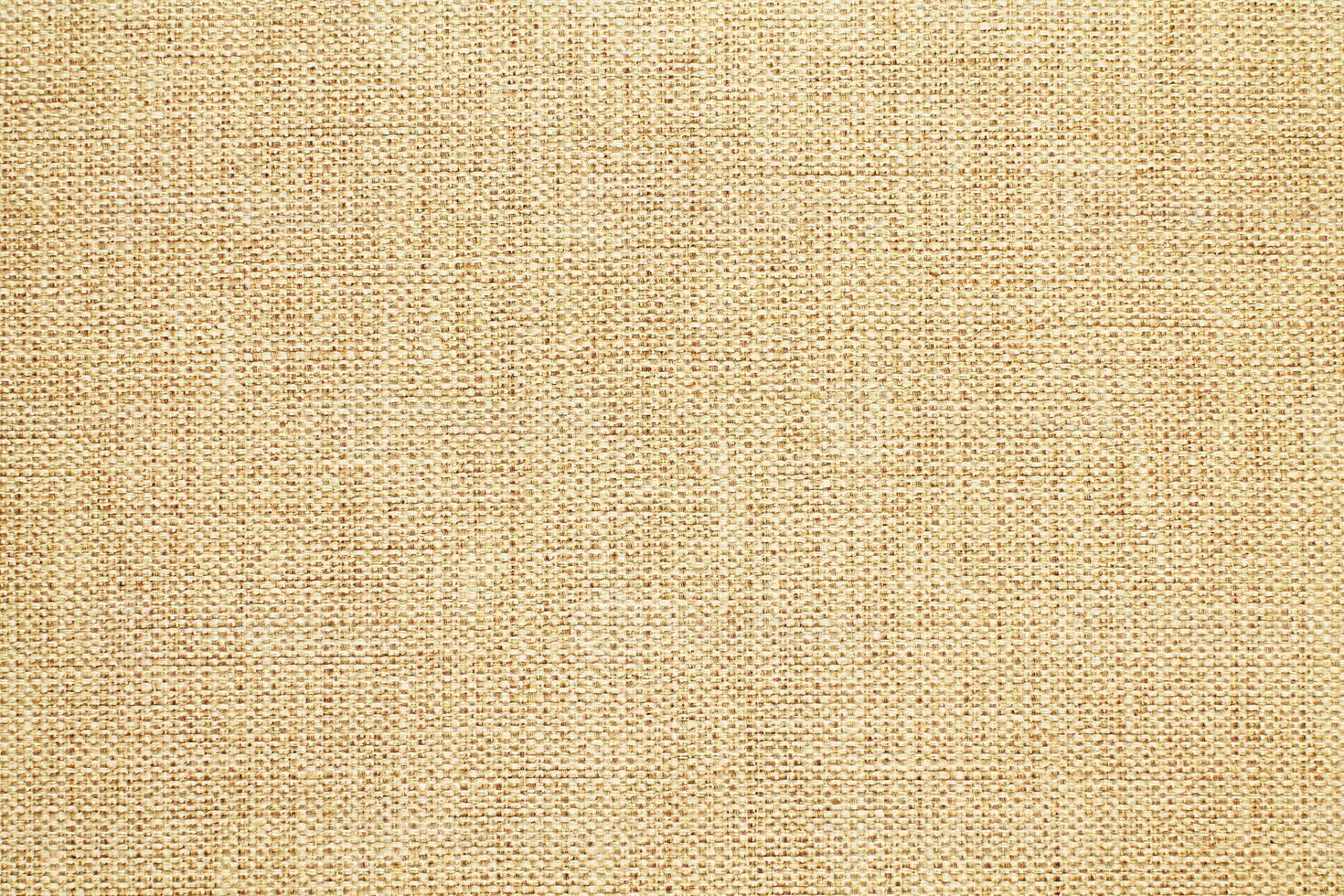 Natural linen material textile canvas Fabric texture background Close-up detail of fabric natural color Hemp material pattern design wallpaper. can be used as background or for graphic design photo