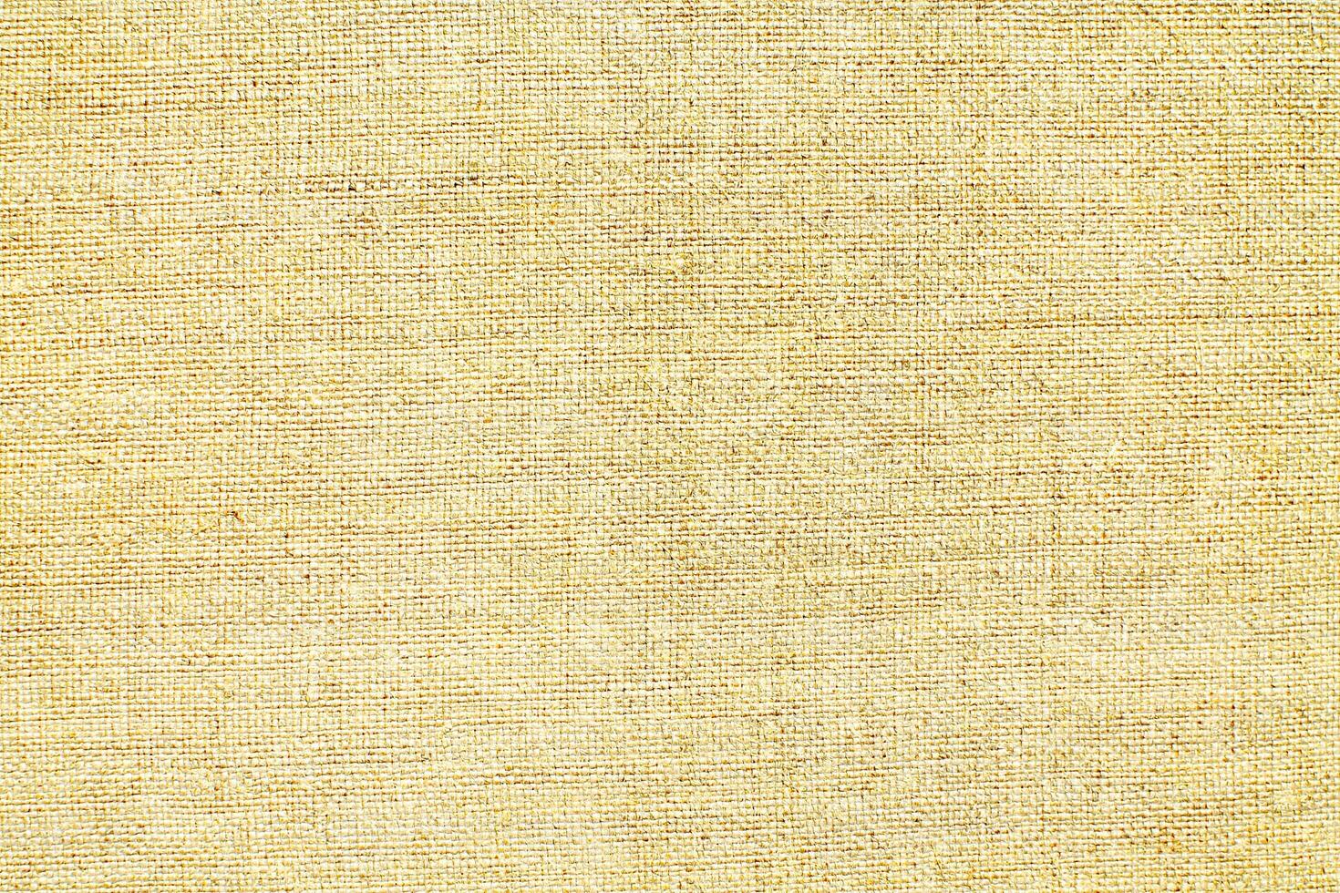 Natural linen material textile canvas Fabric texture background Close-up detail of fabric natural color Hemp material pattern design wallpaper. can be used as background or for graphic design photo