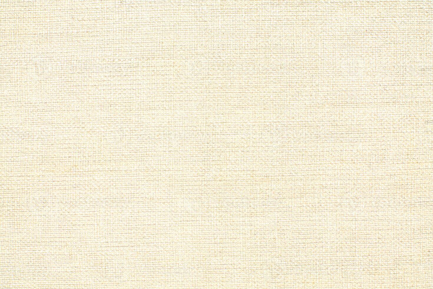 Natural linen material textile canvas Fabric texture background Close-up detail of fabric natural color Hemp material pattern design wallpaper. can be used as background or for graphic design photo