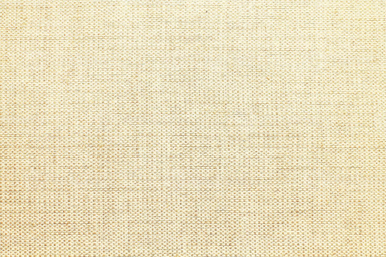 Natural linen material textile canvas Fabric texture background Close-up detail of fabric natural color Hemp material pattern design wallpaper. can be used as background or for graphic design photo