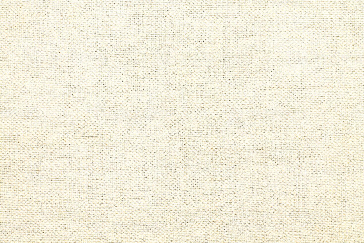 Natural linen material textile canvas Fabric texture background Close-up detail of fabric natural color Hemp material pattern design wallpaper. can be used as background or for graphic design photo