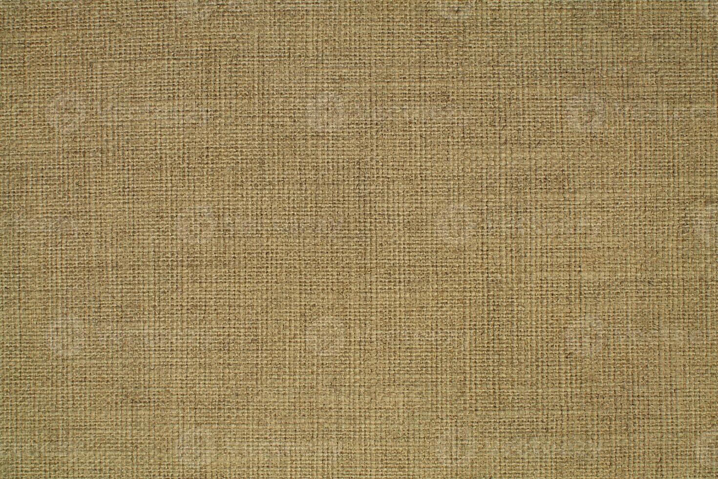 Natural linen material textile canvas Fabric texture background Close-up detail of fabric natural color Hemp material pattern design wallpaper. can be used as background or for graphic design photo