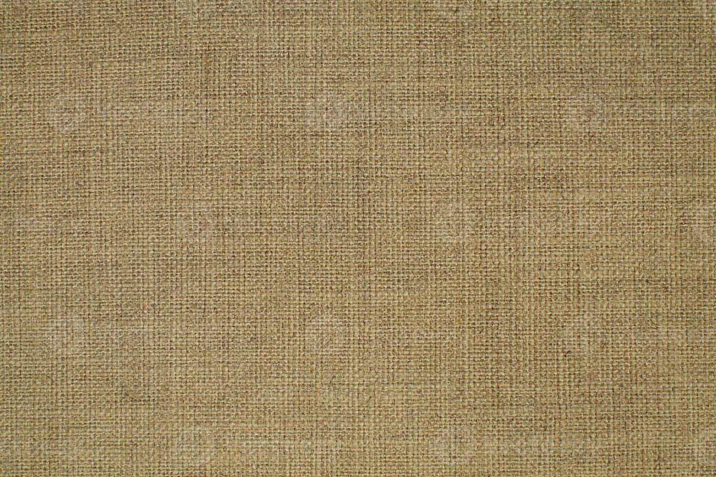 Natural linen material textile canvas Fabric texture background Close-up detail of fabric natural color Hemp material pattern design wallpaper. can be used as background or for graphic design photo