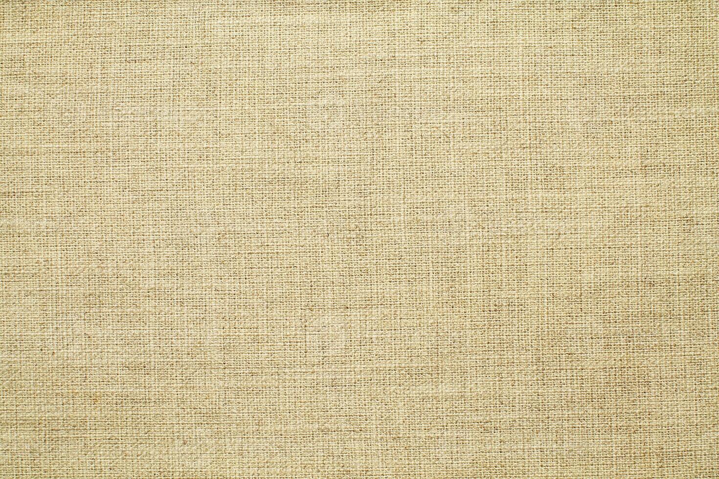 Natural linen material textile canvas Fabric texture background Close-up detail of fabric natural color Hemp material pattern design wallpaper. can be used as background or for graphic design photo