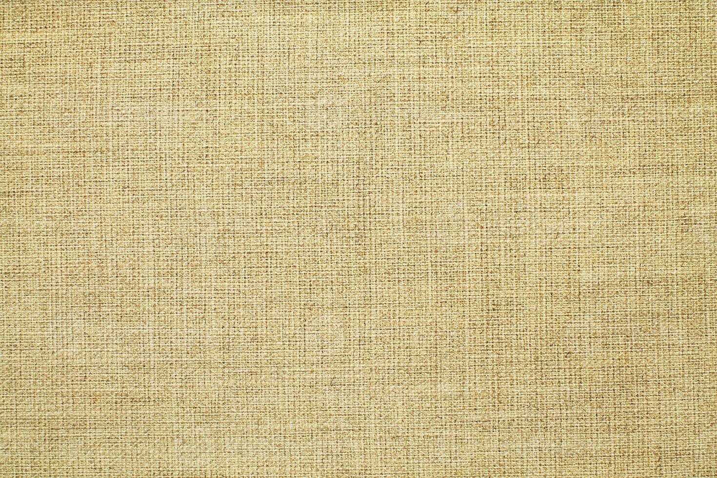 Natural linen material textile canvas Fabric texture background Close-up detail of fabric natural color Hemp material pattern design wallpaper. can be used as background or for graphic design photo