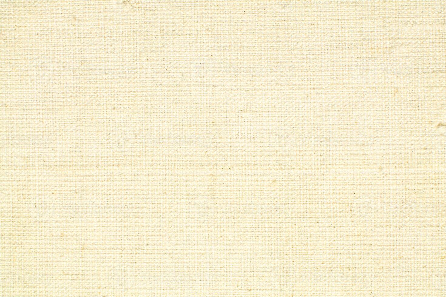 Natural linen material textile canvas Fabric texture background Close-up detail of fabric natural color Hemp material pattern design wallpaper. can be used as background or for graphic design photo