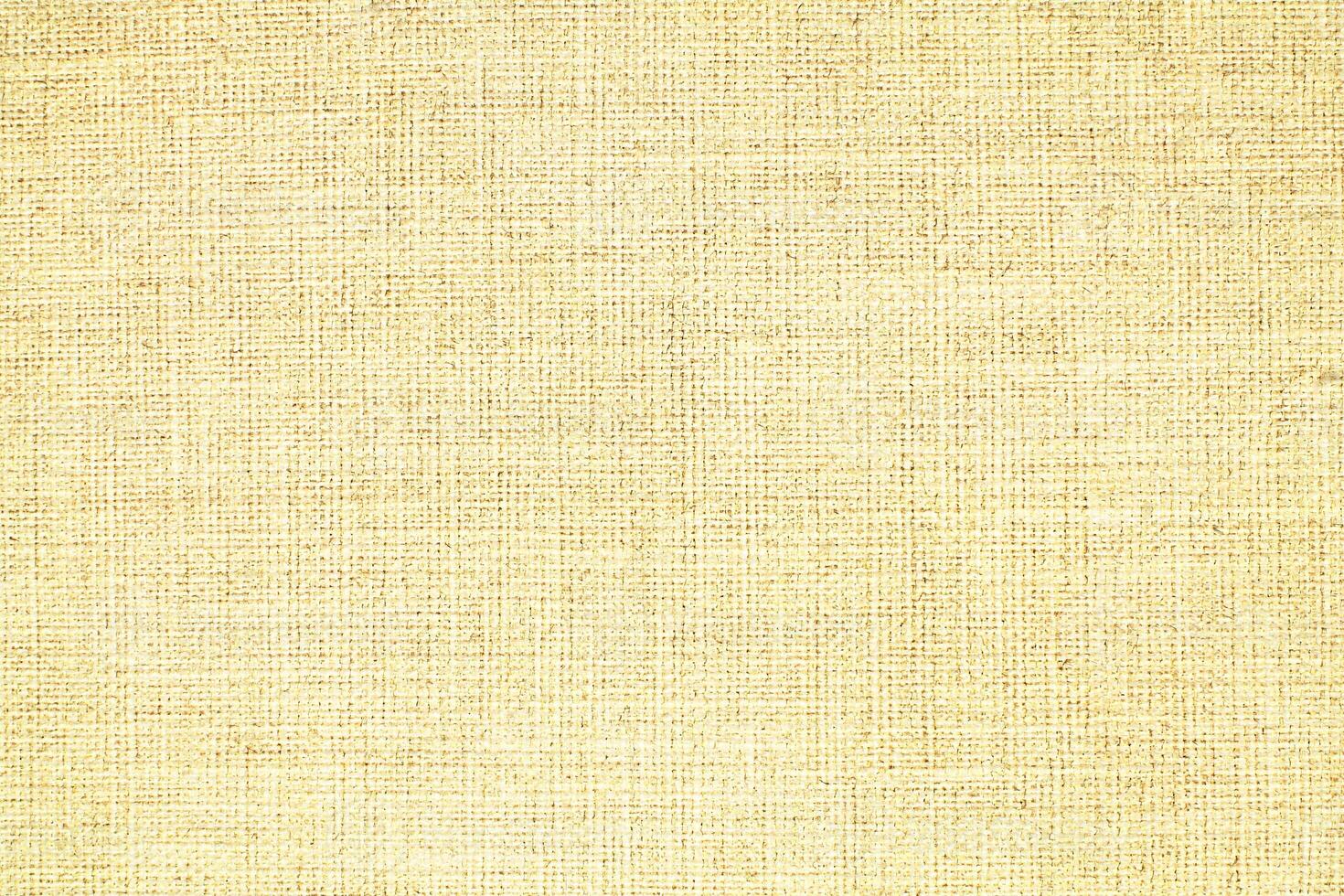 Natural linen material textile canvas Fabric texture background Close-up detail of fabric natural color Hemp material pattern design wallpaper. can be used as background or for graphic design photo
