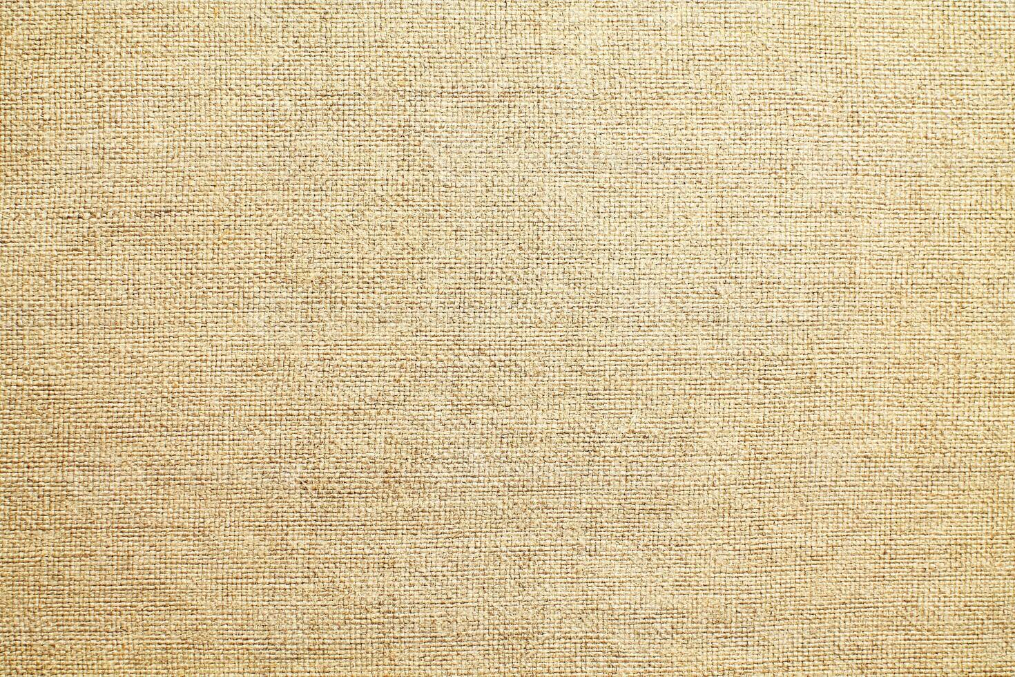 Natural linen material textile canvas Fabric texture background Close-up detail of fabric natural color Hemp material pattern design wallpaper. can be used as background or for graphic design photo