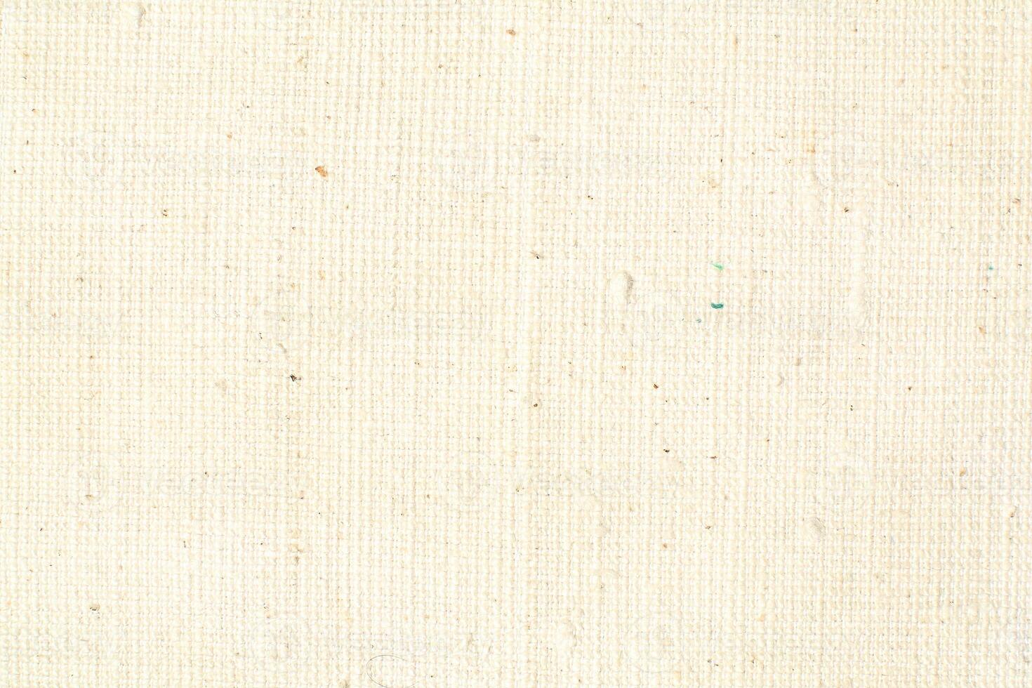 Natural linen material textile canvas Fabric texture background Close-up detail of fabric natural color Hemp material pattern design wallpaper. can be used as background or for graphic design photo