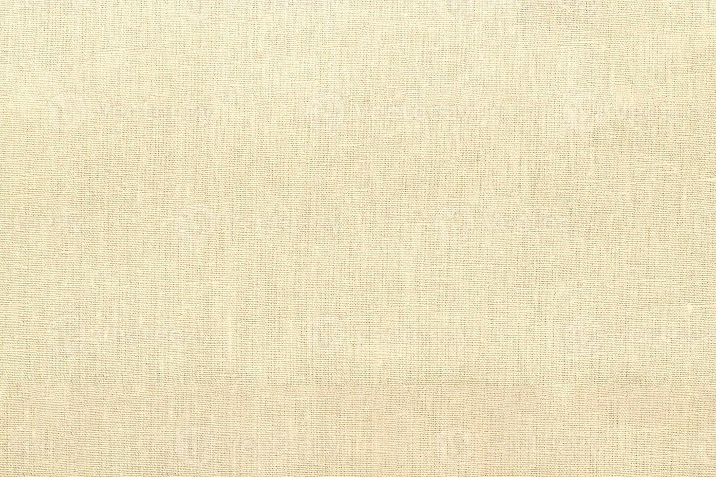 Natural linen material textile canvas Fabric texture background Close-up detail of fabric natural color Hemp material pattern design wallpaper. can be used as background or for graphic design photo