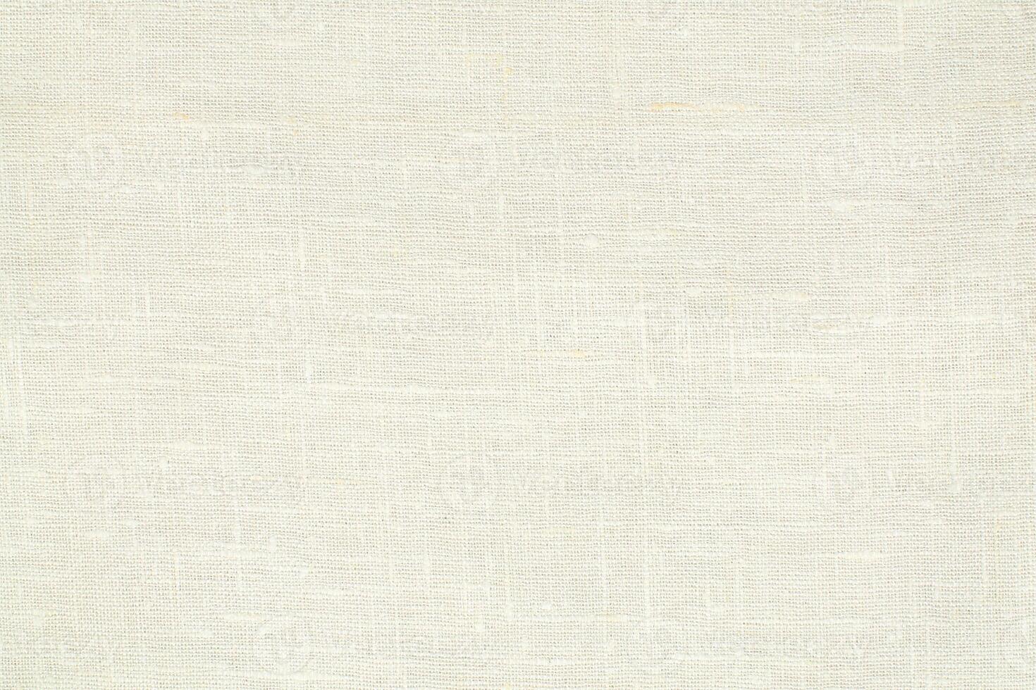 Natural linen material textile canvas Fabric texture background Close-up detail of fabric natural color Hemp material pattern design wallpaper. can be used as background or for graphic design photo