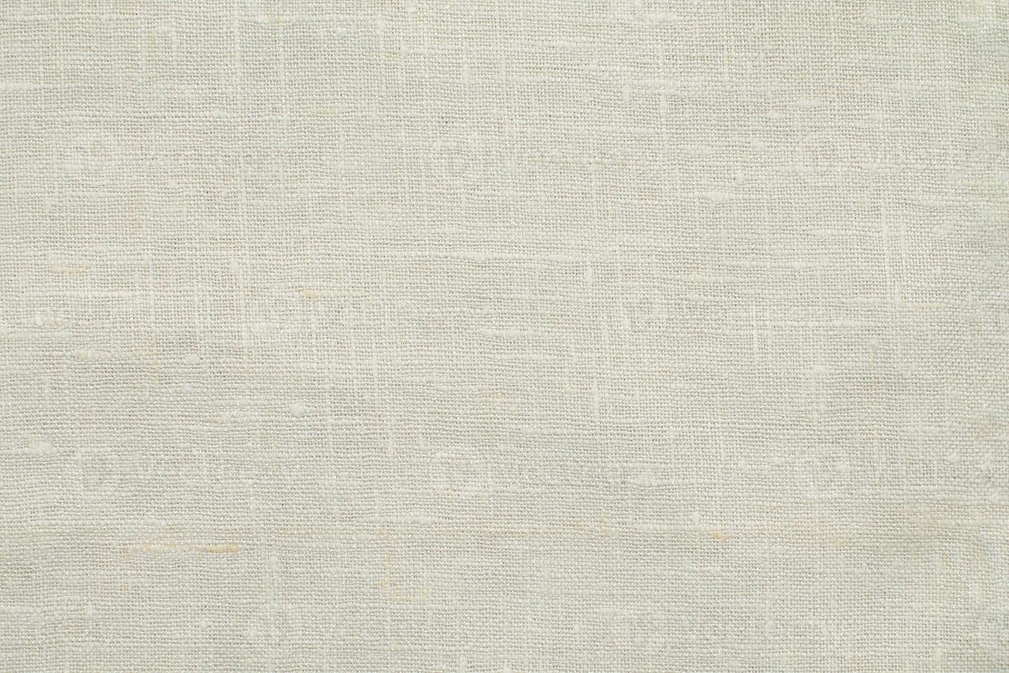 Natural linen material textile canvas Fabric texture background Close-up detail of fabric natural color Hemp material pattern design wallpaper. can be used as background or for graphic design photo