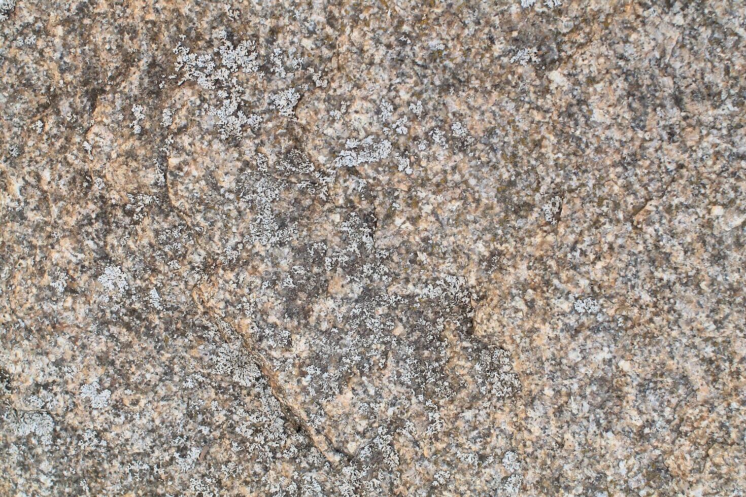 Abstract natural rock stone granite grunge rusty metal texture design background natural color stone material granite design wallpaper. Close-up detail of natural stone photo
