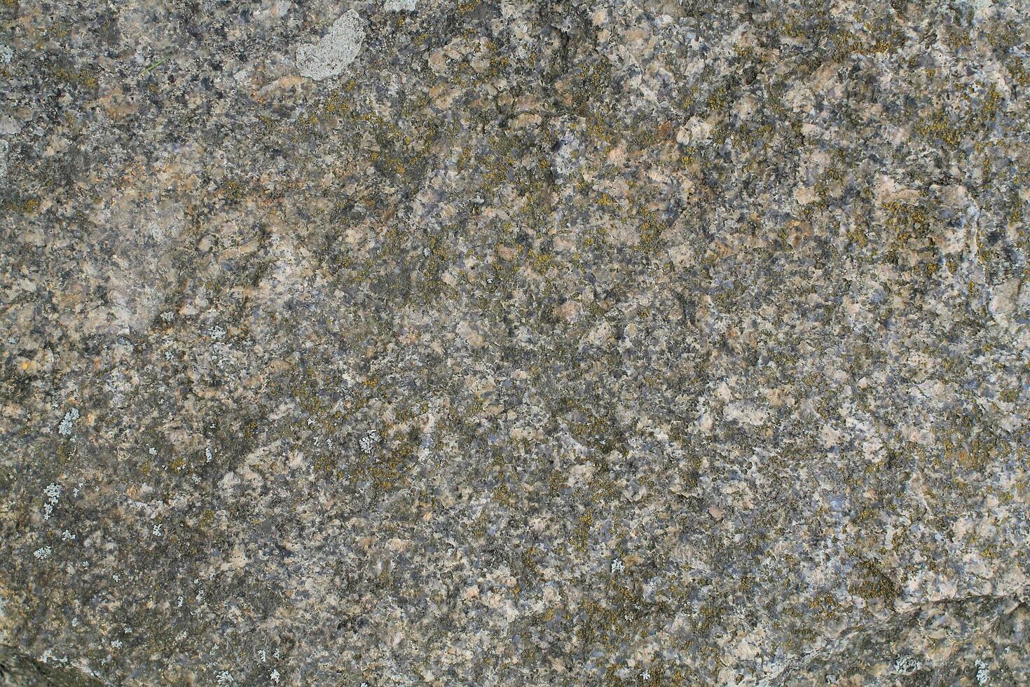 Abstract natural rock stone granite grunge rusty metal texture design background natural color stone material granite design wallpaper. Close-up detail of natural stone photo