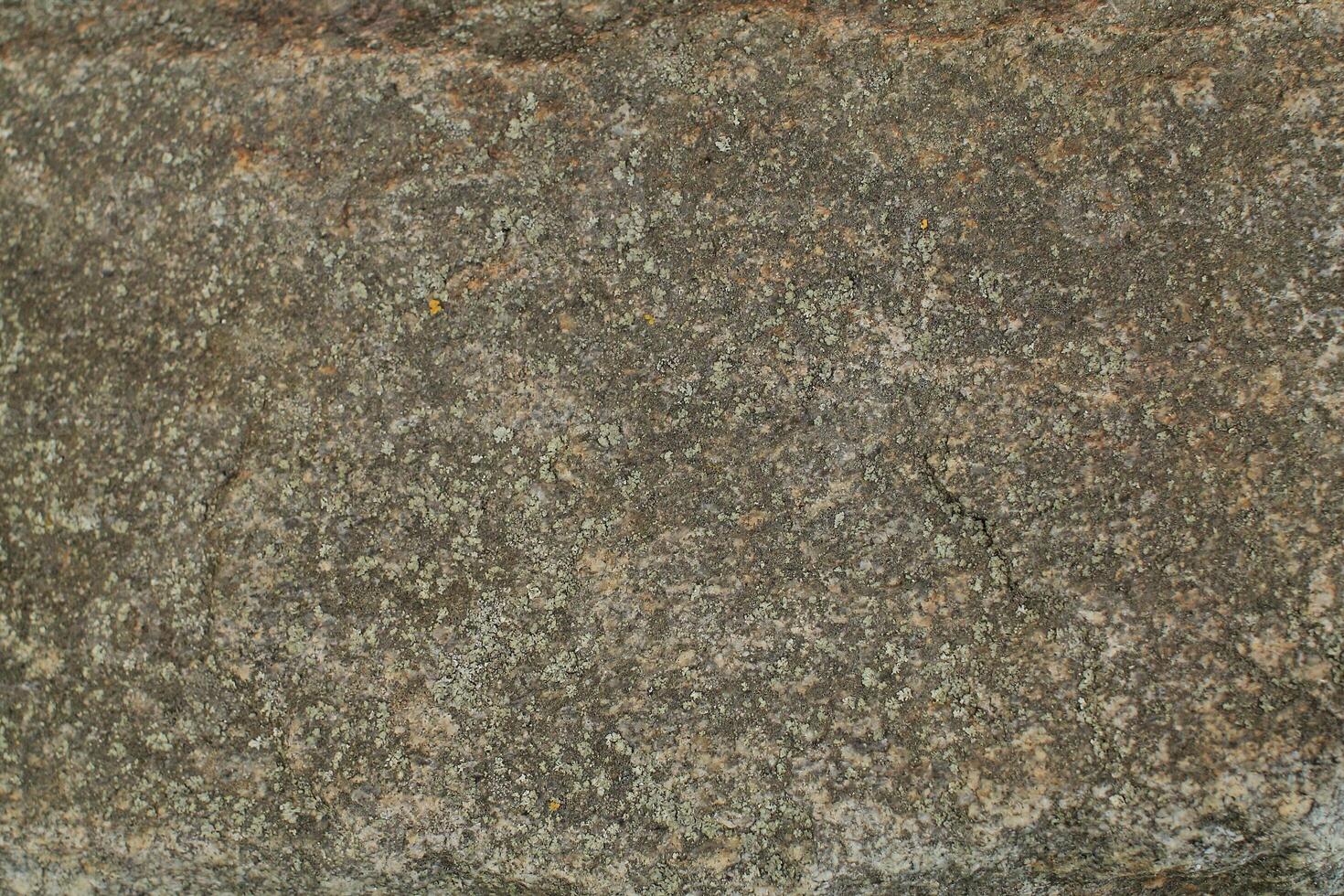 Abstract natural rock stone granite grunge rusty metal texture design background natural color stone material granite design wallpaper. Close-up detail of natural stone photo
