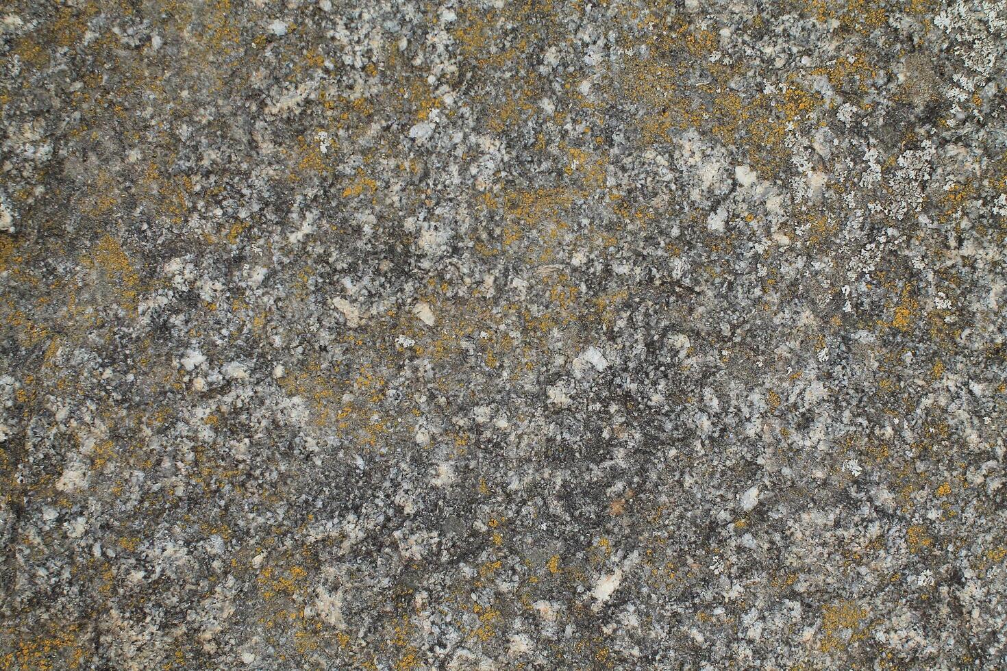 Abstract natural rock stone granite grunge rusty metal texture design background natural color stone material granite design wallpaper. Close-up detail of natural stone photo