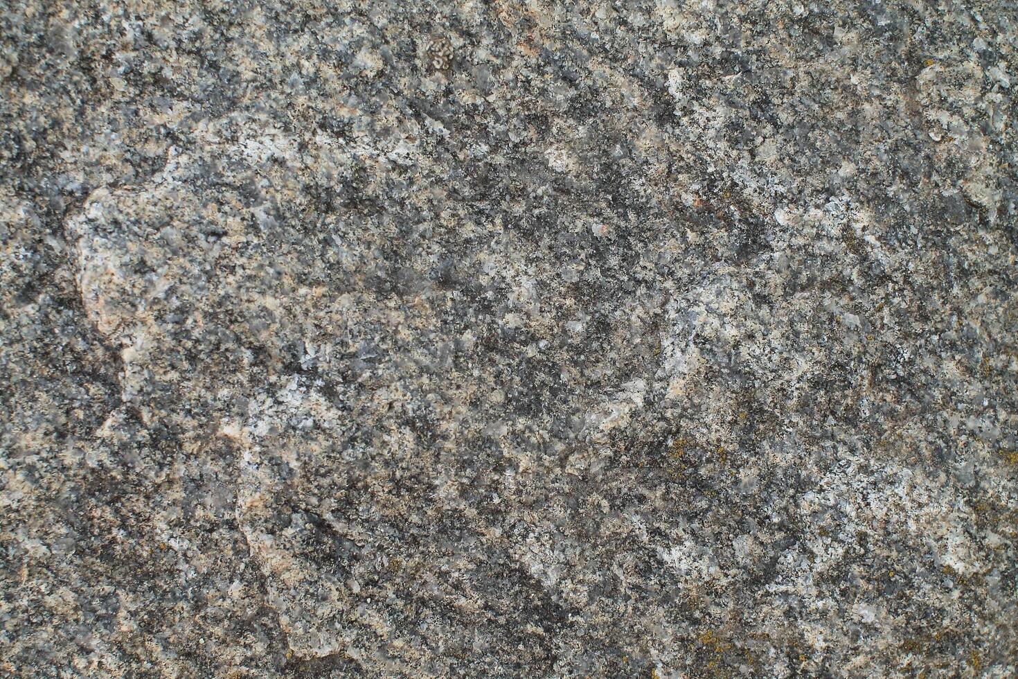 Abstract natural rock stone granite grunge rusty metal texture design background natural color stone material granite design wallpaper. Close-up detail of natural stone photo