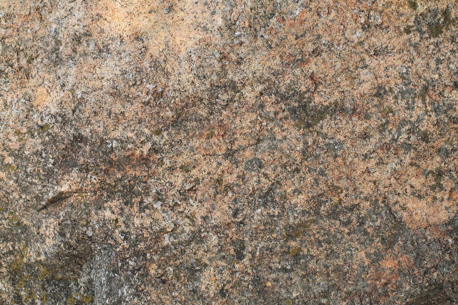 Abstract natural rock stone granite grunge rusty metal texture design background natural color stone material granite design wallpaper. Close-up detail of natural stone photo