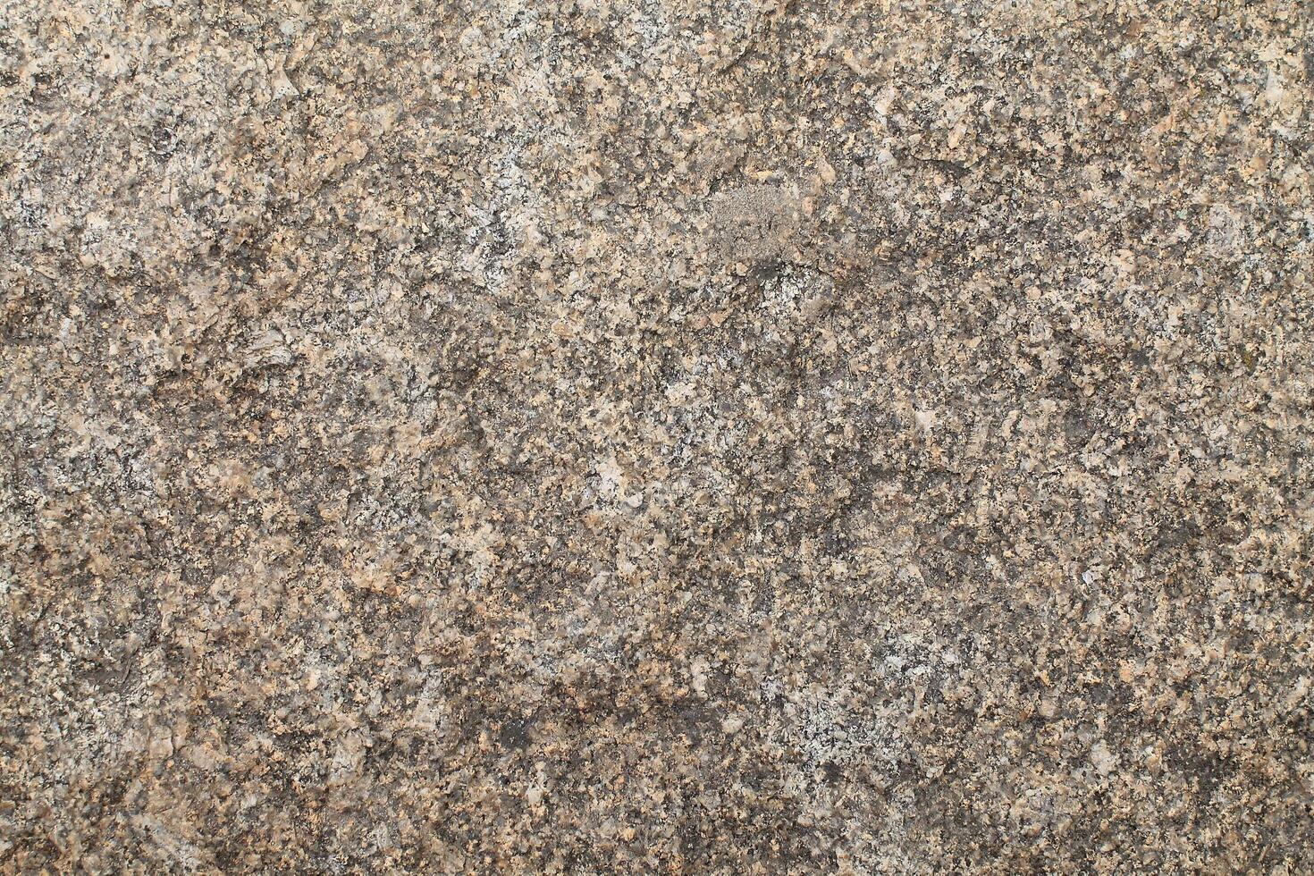 Abstract natural rock stone granite grunge rusty metal texture design background natural color stone material granite design wallpaper. Close-up detail of natural stone photo