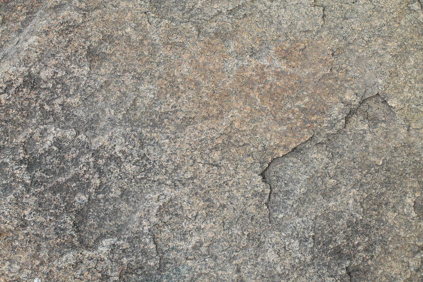 Abstract natural rock stone granite grunge rusty metal texture design background natural color stone material granite design wallpaper. Close-up detail of natural stone photo