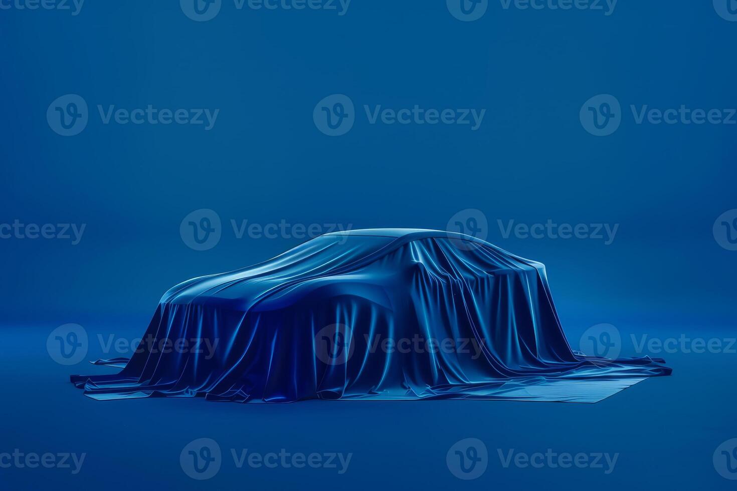 A photo of a car covered with a dark blue cloth. The fabric covering of the car for the presentation.