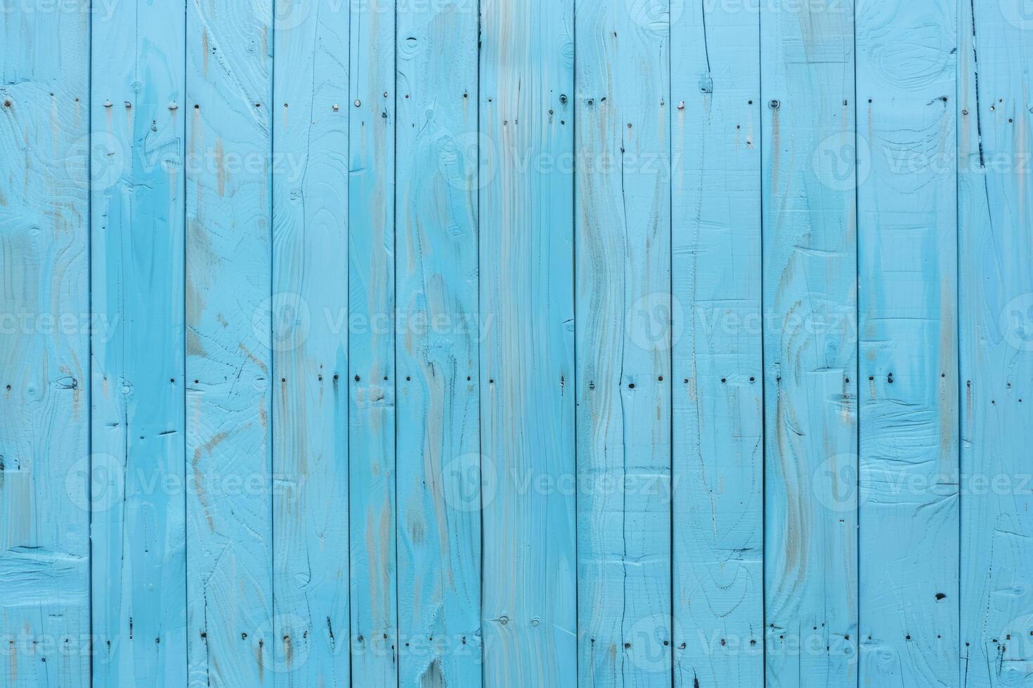 Light blue background with wood texture. The pattern on the surface of the wooden wall in pastel colors. A natural drawing for the interior design concept. photo