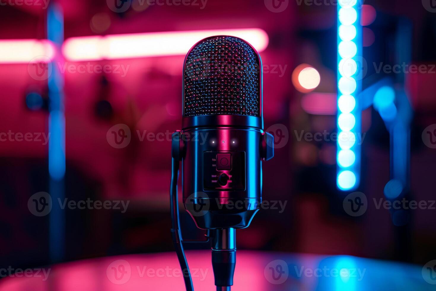 a voice and text microphone in neon light. Studio microphone on a dark background. Retro microphone. photo