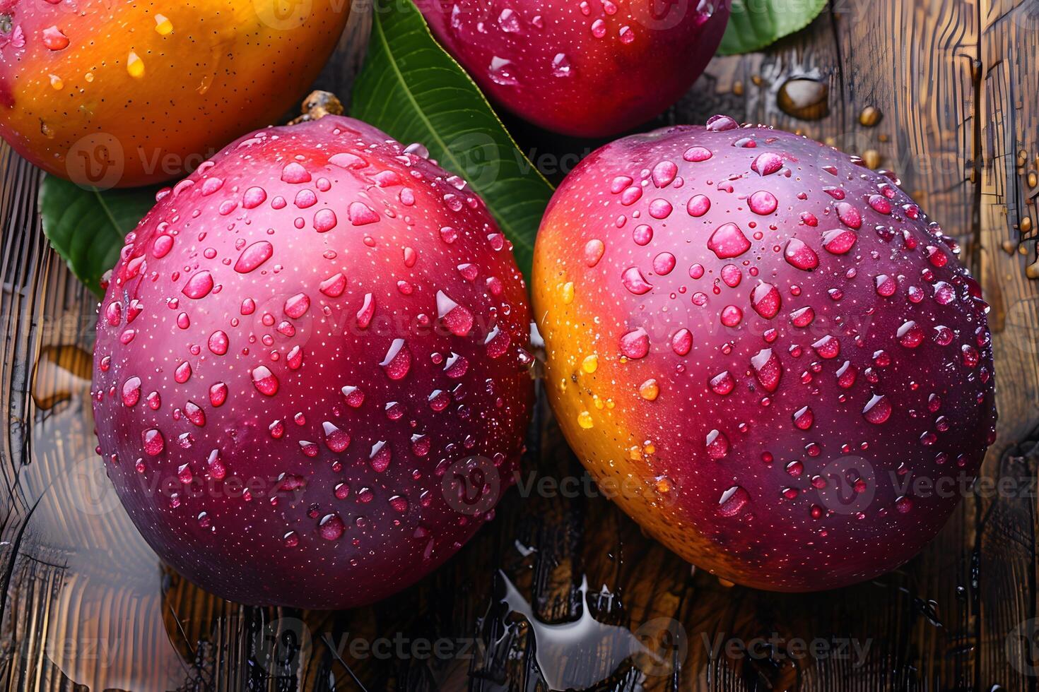 Fresh Wet Mangoes with Water Droplets on Wooden Table - Concept for Summer Fruits, Natural Refreshment, and Vibrant Produce photo