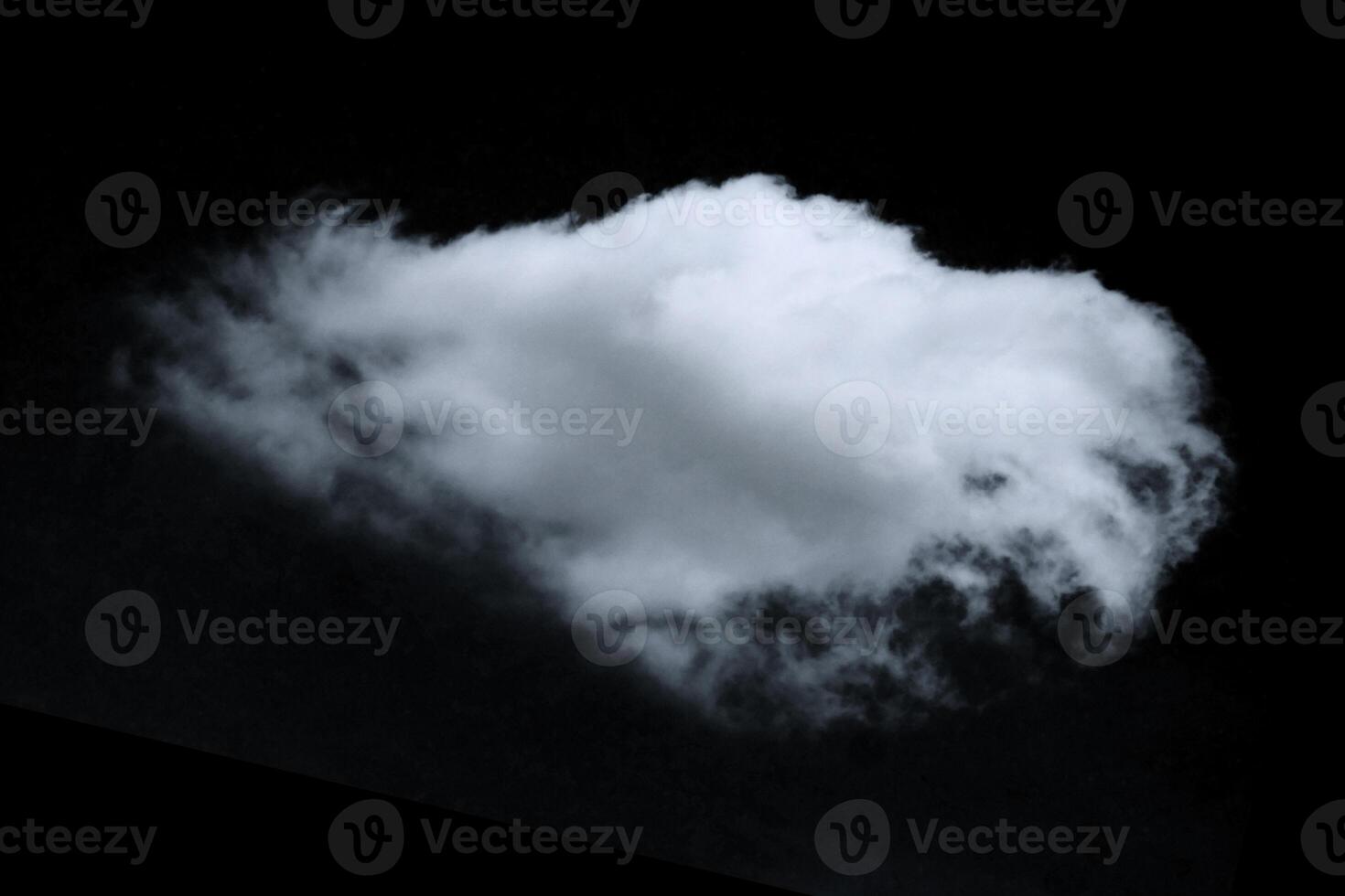 Single Isolated White Cloud Against a Dark Sky Background in High Resolution photo