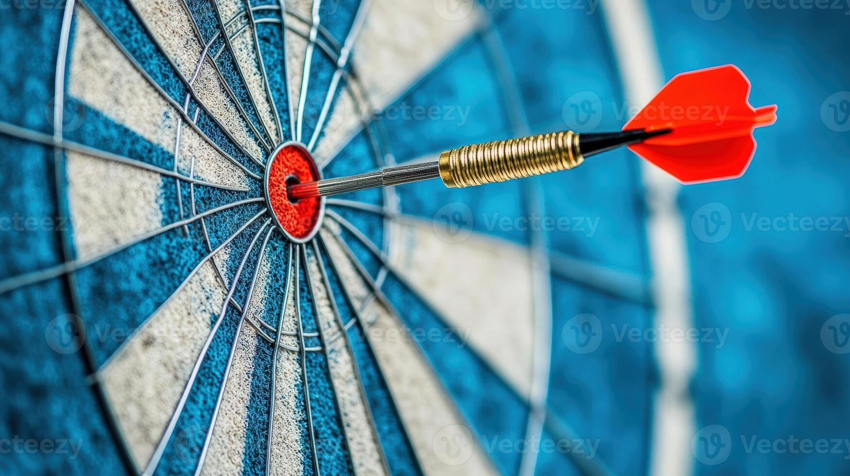 A close-up of a dart hitting the bullseye on a dartboard, symbolizing precision and achievement in target practice. photo
